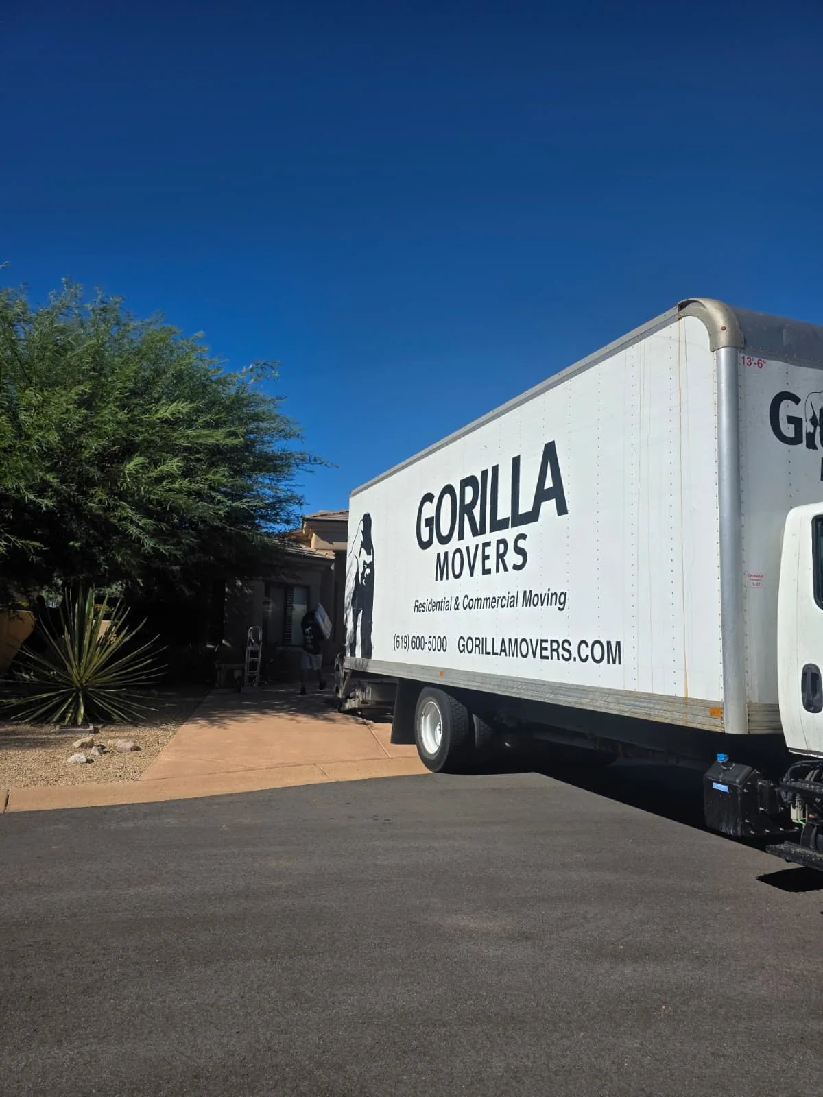 Gorilla Movers truck backed up to a desert home on an Arizona delivery