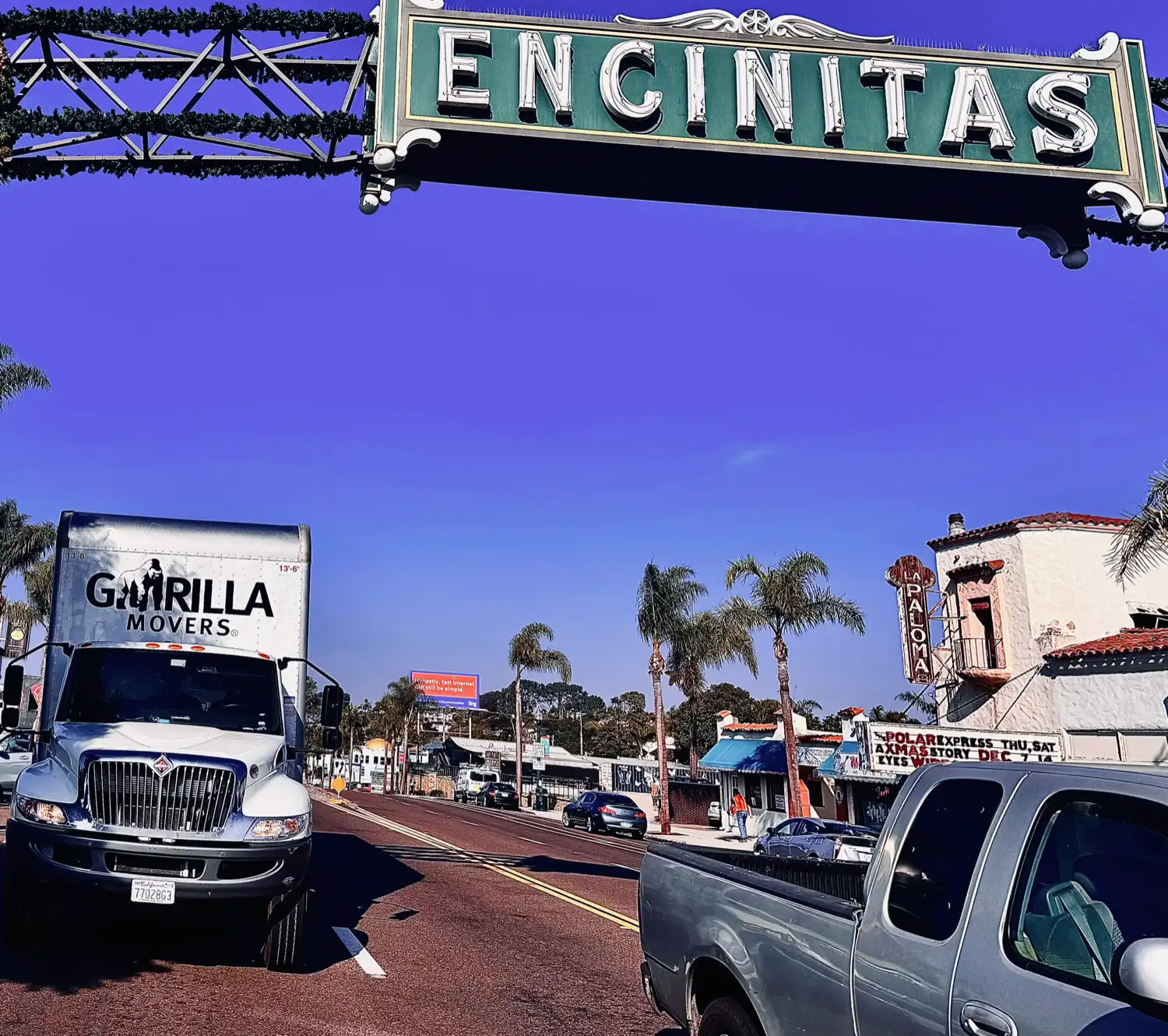 Gorilla Movers box truck on Coast Highway 101 beneath the Encinitas sign