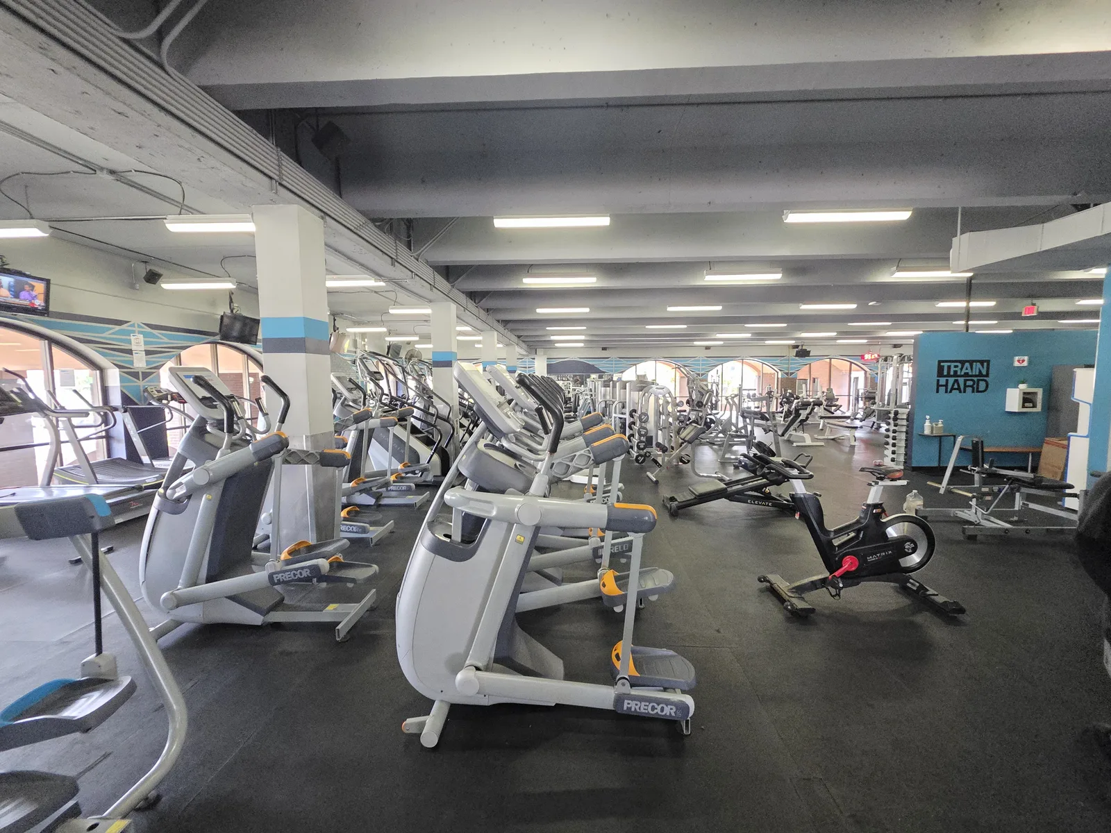 Gorilla Movers team disassembling cable machine at La Jolla gym