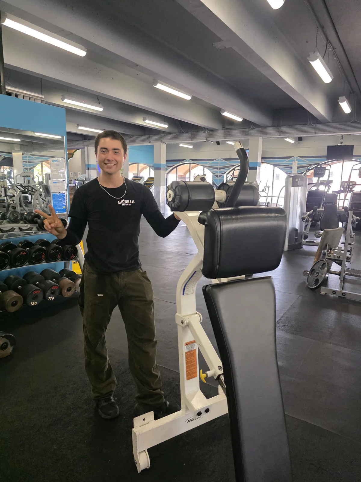 Gorilla Movers positioning treadmill in new La Jolla fitness center
