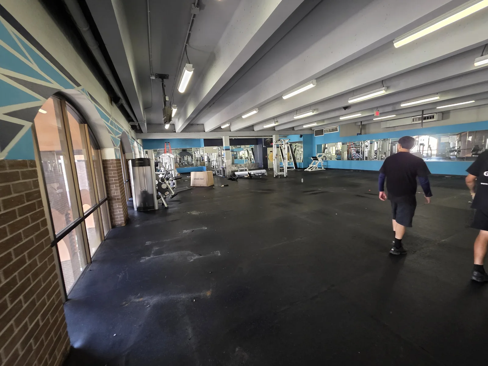 Gorilla Movers reassembling pull-up rig at La Jolla fitness facility