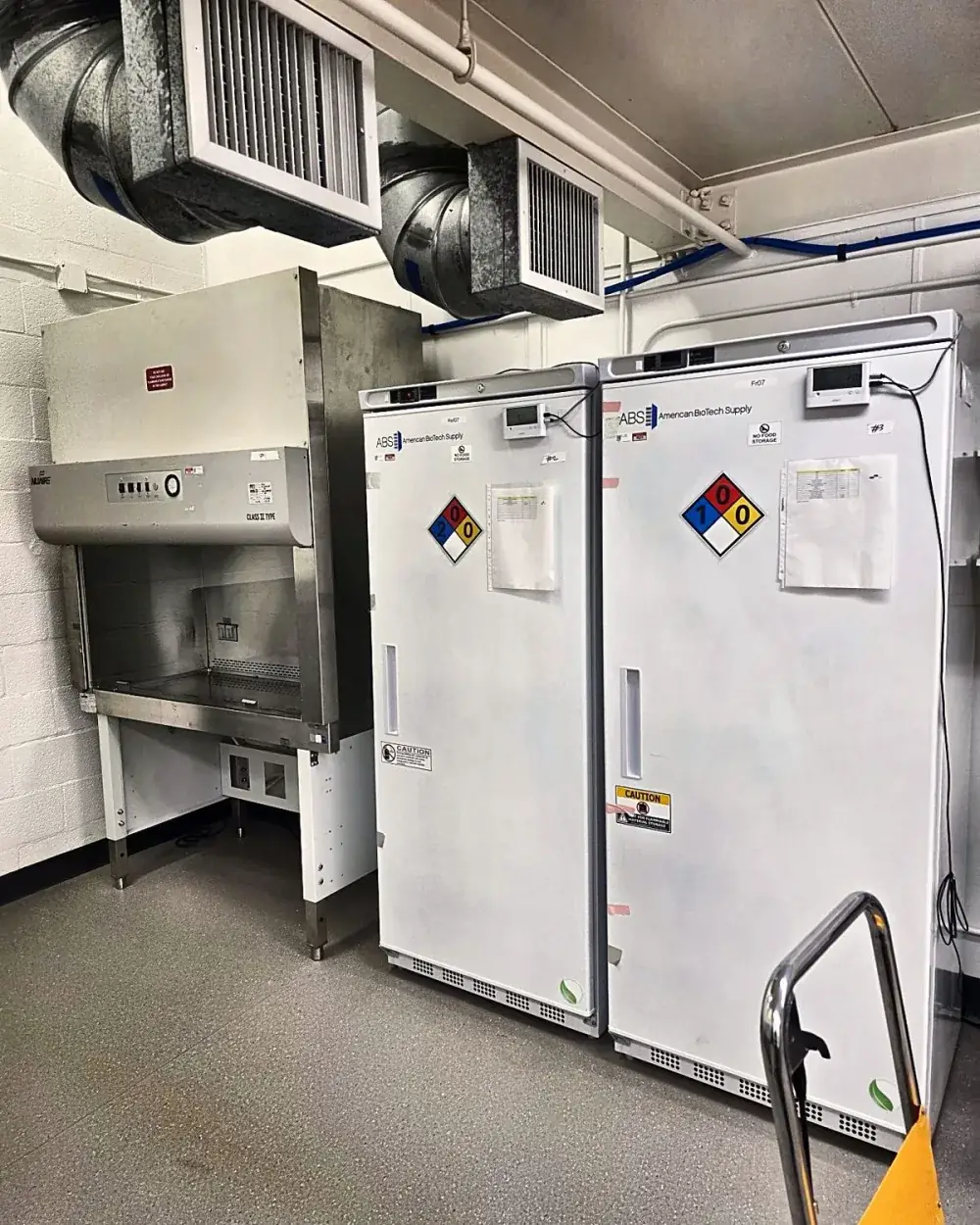 Biosafety cabinet and lab freezer installed and set in place, job complete