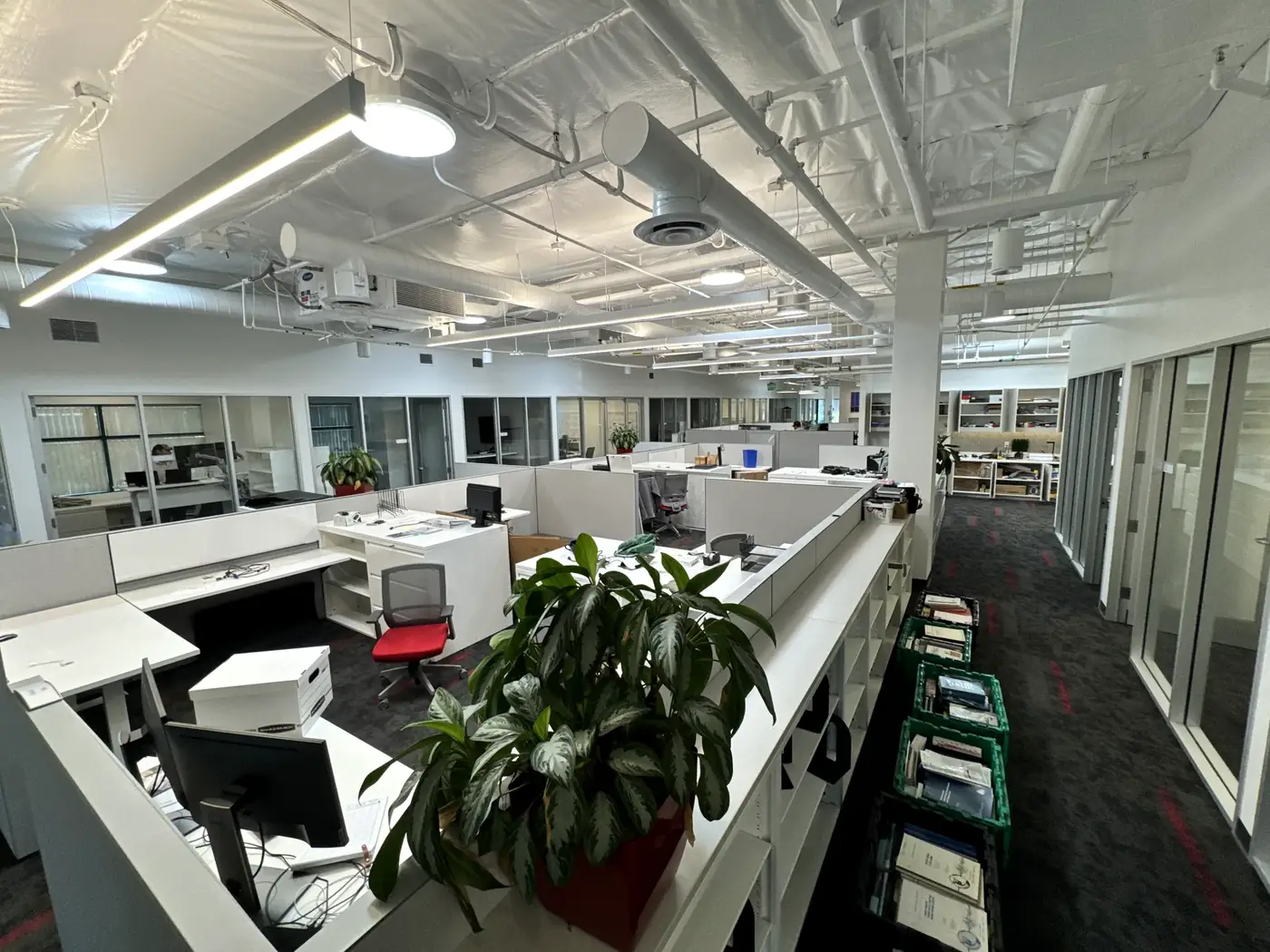 Workstation mid-assembly during an FF&E installation at a San Diego office