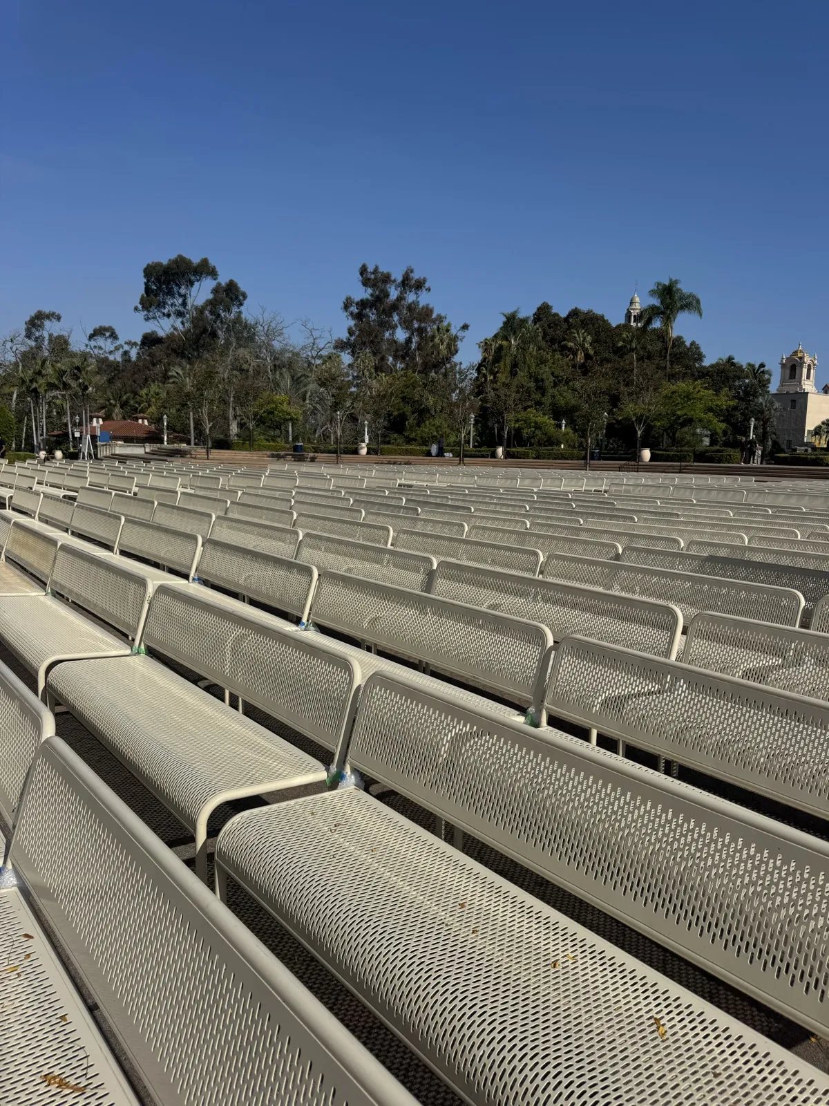 Benches lined up across the organ pavilion plaza in Balboa Park