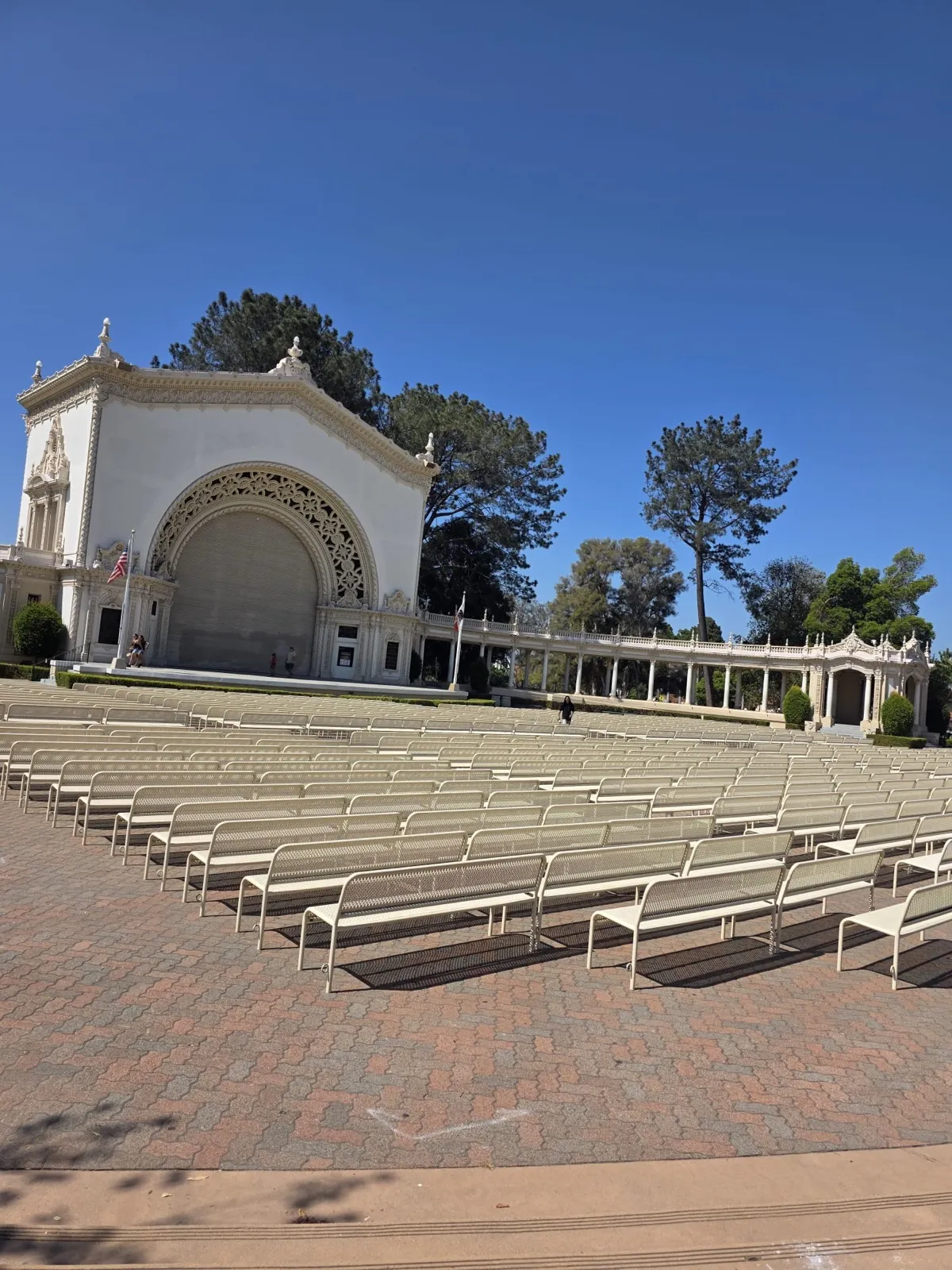 Rows of benches reset in front of the Spreckels Organ Pavilion in Balboa Park