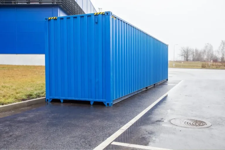 Steel shipping container staged for transport