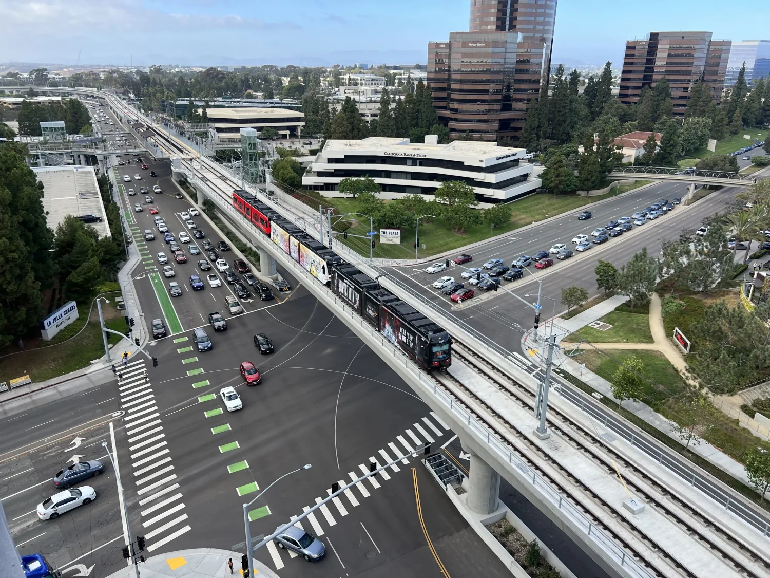 Aerial view of University City and UTC, the Blue Line trolley on La Jolla Village Drive with the UTC office towers